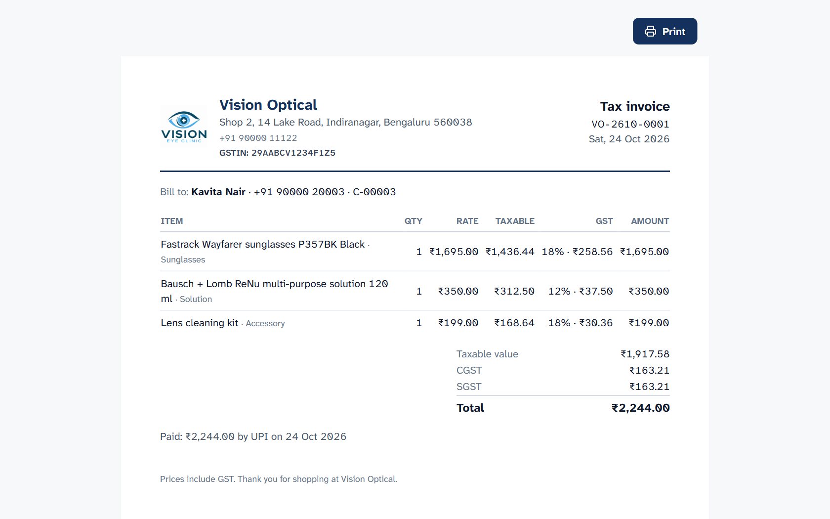 A printed GST tax invoice from the optical store with taxable value, CGST and SGST